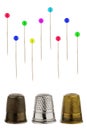 Three thimbles with pins Royalty Free Stock Photo