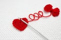 The Three Thread Loops. Festive Photo, Knitting With Love. Handmade Crochet Heart And A Small Red Yarn Ball On The White Crochet B