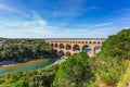 Three-tiered aqueduct Pont du Gard and natural park Royalty Free Stock Photo