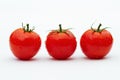 Three tomatoes side by side Royalty Free Stock Photo