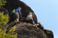 Three tourists on via ferrata