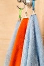 Three towels hanging on a hook Royalty Free Stock Photo