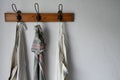 Three towels hung up on a coat rack Royalty Free Stock Photo