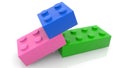 Three toy cubes in various colors Royalty Free Stock Photo