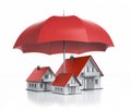 Group of toy houses with one umbrella Royalty Free Stock Photo