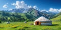 Three traditional Asian nomadic yurt on meadow in highlands against backdrop of mountains in spring Royalty Free Stock Photo