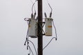 Transformers mounted to utility pole Royalty Free Stock Photo