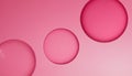Three translucent pink spheres floating against a soft pink gradient background Royalty Free Stock Photo