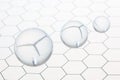 Three transparent balls spheres flying on an honeycomb glass pattern with copy space for your text Royalty Free Stock Photo