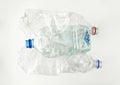 Three transparent plastic bottles without caps on a white background. Recycling plastic. Separate collection and sorting of Royalty Free Stock Photo