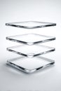 Three transparent square glass plates stacked on a clean white background Royalty Free Stock Photo