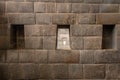 The three trapezoidal windows and Inca Wall of Rainbow Temple at Qoricancha Inca Ruins - Cusco, Peru Royalty Free Stock Photo