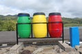 Three Trash Cans, colored Red Yellow and Green
