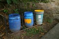 Three trash cans by the roadside Royalty Free Stock Photo