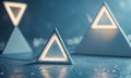 Three triangular light fixtures with glowing white triangular shapes are arranged in triangular formation on