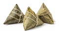 Three Triangular Zongzi Wrapped in Bamboo Leaves Tied with String Royalty Free Stock Photo