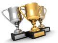 Three trophies, gold, silver and bronze Royalty Free Stock Photo