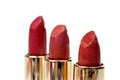 Three tubes of red lipstick Royalty Free Stock Photo