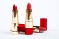 Three tubes of red lipstick Royalty Free Stock Photo