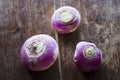 three turnip on a vintage wood background