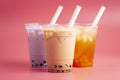 Three Different Types of Boba Tea on a Bright Pink Background Royalty Free Stock Photo