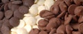 Three types of chocolate chips, dark, white and semi-sweet Royalty Free Stock Photo