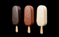 three types ice cream chocolate escimo isolated on black. Chocolate glazed icecream on stick. Ice cream covered in dark, milk and