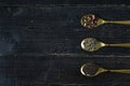 Three types of tea in spoons - green, black and Rooibos Royalty Free Stock Photo