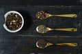 Three types of tea in spoons - green, black and Rooibos Royalty Free Stock Photo