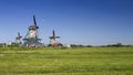 Three typical windmills in Zaanse Schans, Netherlands Royalty Free Stock Photo