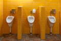 Three urinal in the bathroom