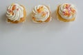 Three vanilla cupcakes Royalty Free Stock Photo