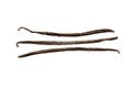 Three vanilla pods aligned on white