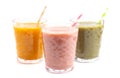 Three Varieties of Healthy Smoothies on a White Background Royalty Free Stock Photo