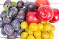 Three varieties of plums Royalty Free Stock Photo