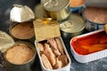 Three varieties of sardine cans, with tomato and with olive and sunflower oil Royalty Free Stock Photo