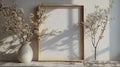 Three Vases With Dried Plants Next to Mirror