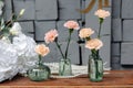 Three vases with flowers on a table Royalty Free Stock Photo