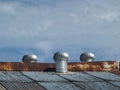 Three ventilators on a roof Royalty Free Stock Photo