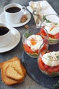 Three verrines breakfast. Poached eggs, tomatoes, zucchini and coffee