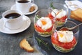 Three verrines breakfast. Poached eggs, tomatoes, zucchini and caps of coffee