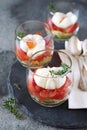 Three verrines breakfast. Poached eggs, tomatoes and zucchini Royalty Free Stock Photo