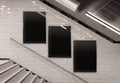 Three vertical billboards on underground stairs wall Mockup. Triptych hoardings advertising in white tiles tunnel interior. 3D