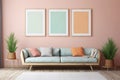 Three vertical picture frames in a modern living room with neutral grey sofa, pillows and plants. Pastel orange wall art mockup Royalty Free Stock Photo