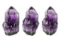 Three vibrant amethyst crystal clusters displaying deep purple hues and sharp facets Royalty Free Stock Photo