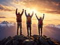 Three victorious senior mountaineers with hands raised on mountain top in sunset celebrating their accomplishment,