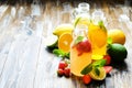 Summer healthy non alcoholic cocktails, citrus infused water drinks, lemonades with lime lemon or orange, diet detox beverages. Royalty Free Stock Photo