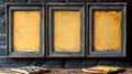 Three vintage, distressed yellow frames against a dark brick wall. Perfect for showcasing art, announcements, or adding a rustic Royalty Free Stock Photo