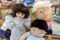 Three Vintage Dolls in a Thrift Store