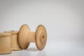 Three vintage empty wooden cotton reels.